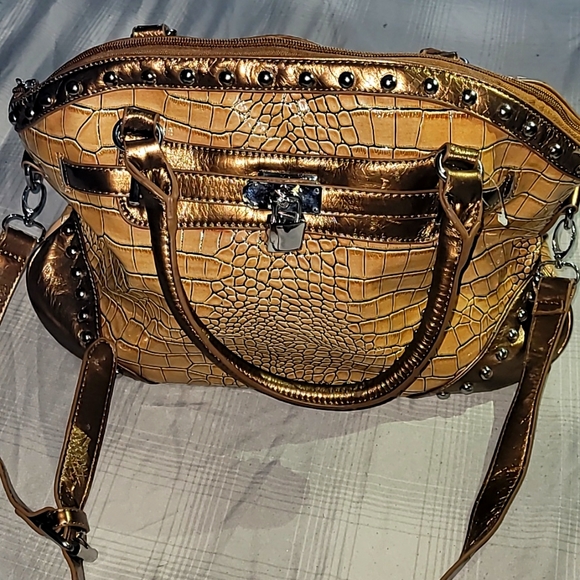 Handbags - A pocket book and or, referred to as hand bag